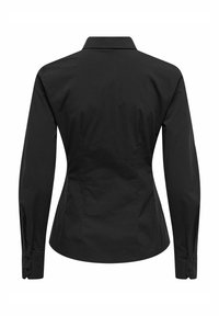 Chemise noire cintrée à manches longues avec col, poignets boutonnés et taille légèrement fuselée, vue de dos sur fond blanc.