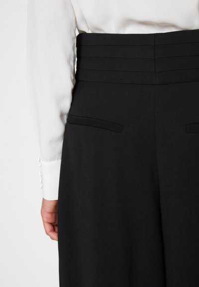 Iro JEON - Pantalon classique - black