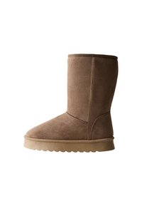 Bruna mocka ankle boots med rund tå, slät yta och en platt gummisål. Vertikala sömdetaljer på utsidan.