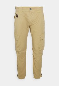 Khaki cargo pants made of durable fabric, featuring side cargo pockets, a zippered ankle detail, and a button closure at the waist.