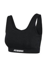 Black sports bra with wide straps and white "HUMMEL" logo centered on the elastic band below the bust.
