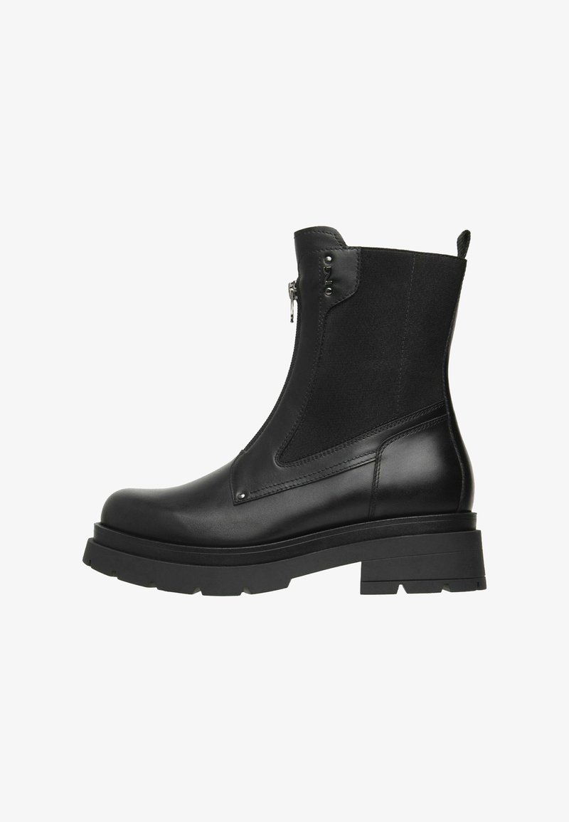 Black ankle boots with a smooth leather finish, elastic side panels, and a chunky rubber sole. Features an inner zipper and flat heel.