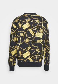 Sweat-shirt noir avec chaîne dorée et motif d’étiquettes avec les logos Versace Jeans Couture partout.