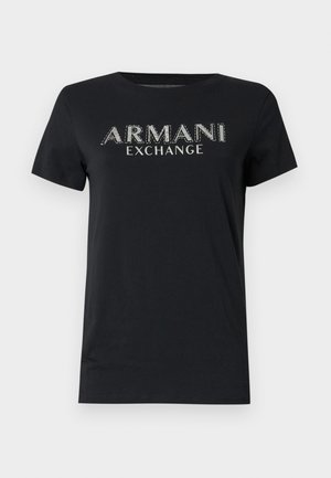 T-shirt nera in cotone con maniche corte, scollatura rotonda, con il logo "ARMANI EXCHANGE" in lettere argentate scintillanti.