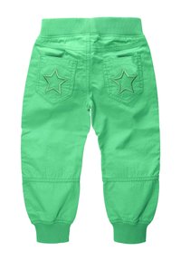 Gröna bomullsjoggers med ribbad midja, smalnande ärmslut och stjärnformad broderi på två bakfickor. Slät textur, avslappnad stil.