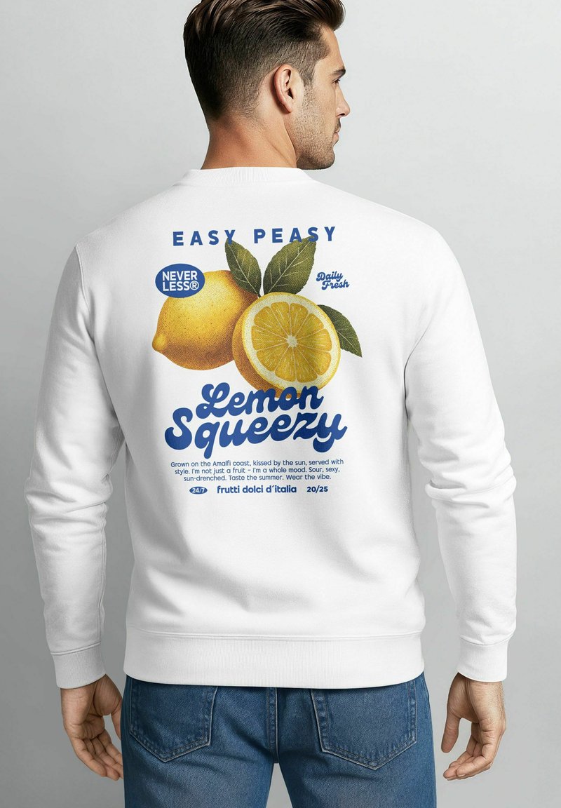 White sweatshirt featuring a vibrant lemon graphic and blue text on the back, with green leaves and a textured design.