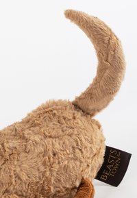 Brown plush toy with soft fur texture, featuring a curved tail and a label reading "BEASTS TOWN" in black text.