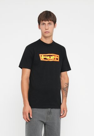 Black cotton t-shirt featuring a bold red and yellow graphic logo on the front. Short sleeves and a classic crew neck design.