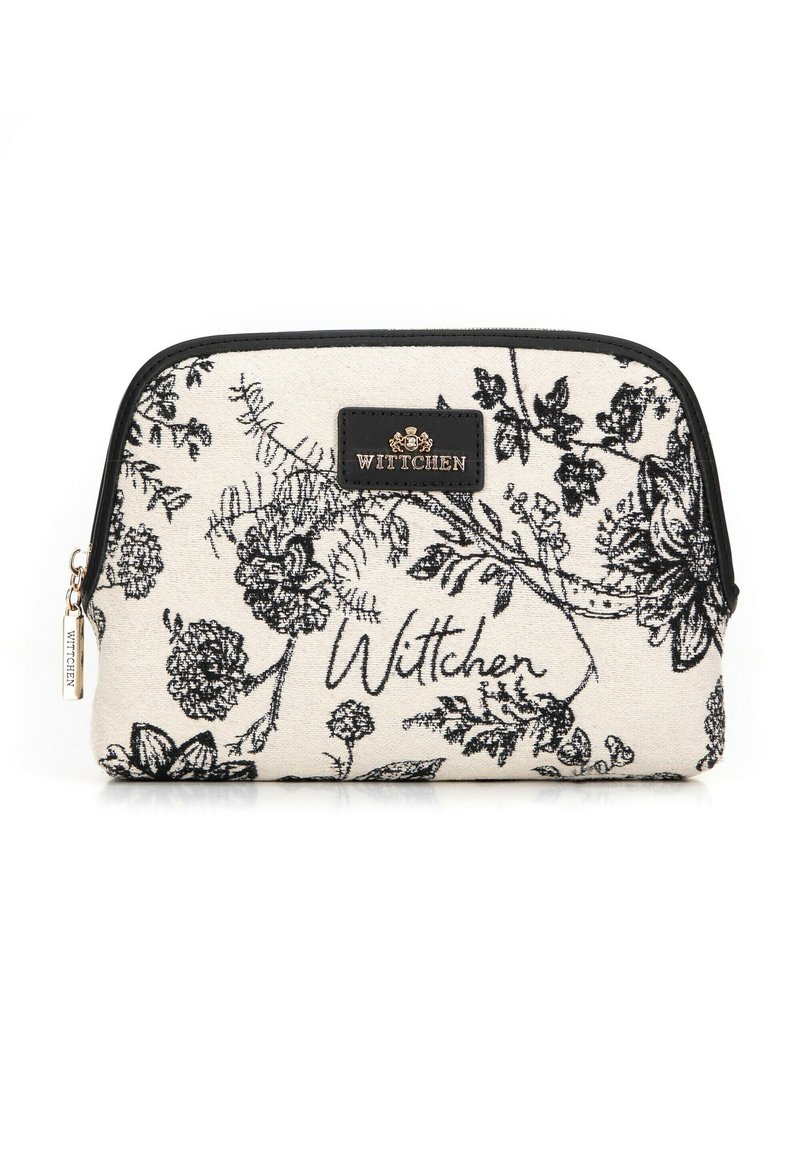 Cosmetica pouch met bloemendruk in beige stof met zwarte bloempatronen. Voorzien van een zwarte rits en een logoplaatje aan de voorkant.