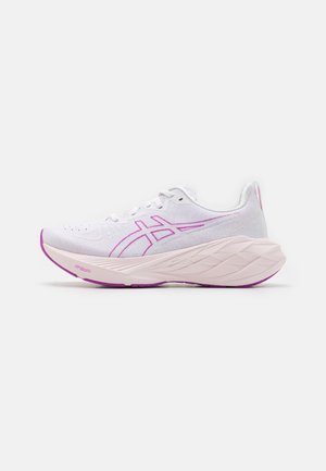 White athletic shoe with pink accents, textured upper, lightweight design, and a chunky, multi-layered sole. Features logo on side.
