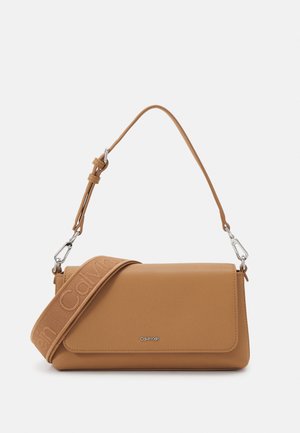 MUST CONVERTIBLE SHOULDER BAG - Taka s pnm popruhem - lion