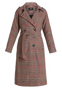 Cappotto scozzese in tonalità beige, rosso e nero. Presenta una chiusura doppiopetto, ampi rever e una vita cinturata. Maniche lunghe e tasche sui fianchi.
