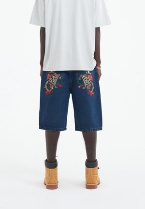MENS SEVER SNAKE DIAMANTE DENIM - Denim shorts - indigo