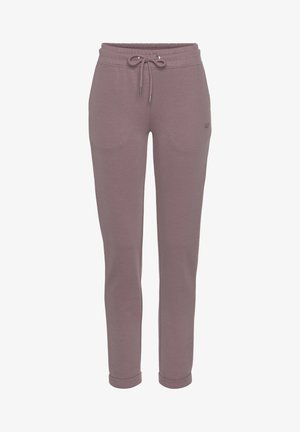 Licht mauve sweatpants van zacht materiaal, met een elastische tailleband met een trekkoord, zijzakken en taps toelopende boorden.