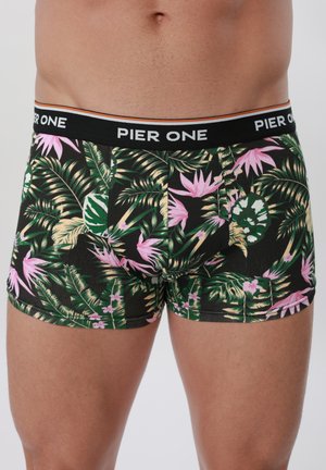 Men's black boxer briefs with green and pink tropical leaf and flower pattern, branded "PIER ONE" on the waistband.