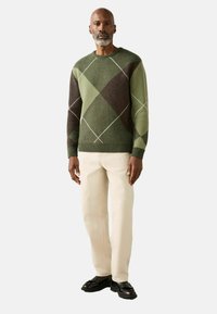 Unselected, green argyle