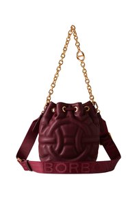 Burgundy leather bucket bag with quilted pattern, gold chain strap, and a fabric shoulder strap featuring "BORBONE" text. Drawstring closure.