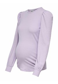 Top maternità di un leggero colore lavanda con corpo a coste e maniche puff testurizzate. Presenta un collo rotondo e polsini aderenti alle estremità delle maniche.