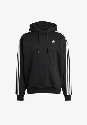 Schwarzer Kapuzenpullover mit weißen Streifen an den Ärmeln, oversized Schnitt, Fronttasche, verstellbare Kordel und kleinem Logo auf der Brust.