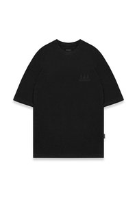Schwarzes, übergroßes T-Shirt mit kurzen Ärmeln, rundem Ausschnitt und einem dezenten Logodetail in der oberen linken Ecke. Glattes Baumwollmaterial.