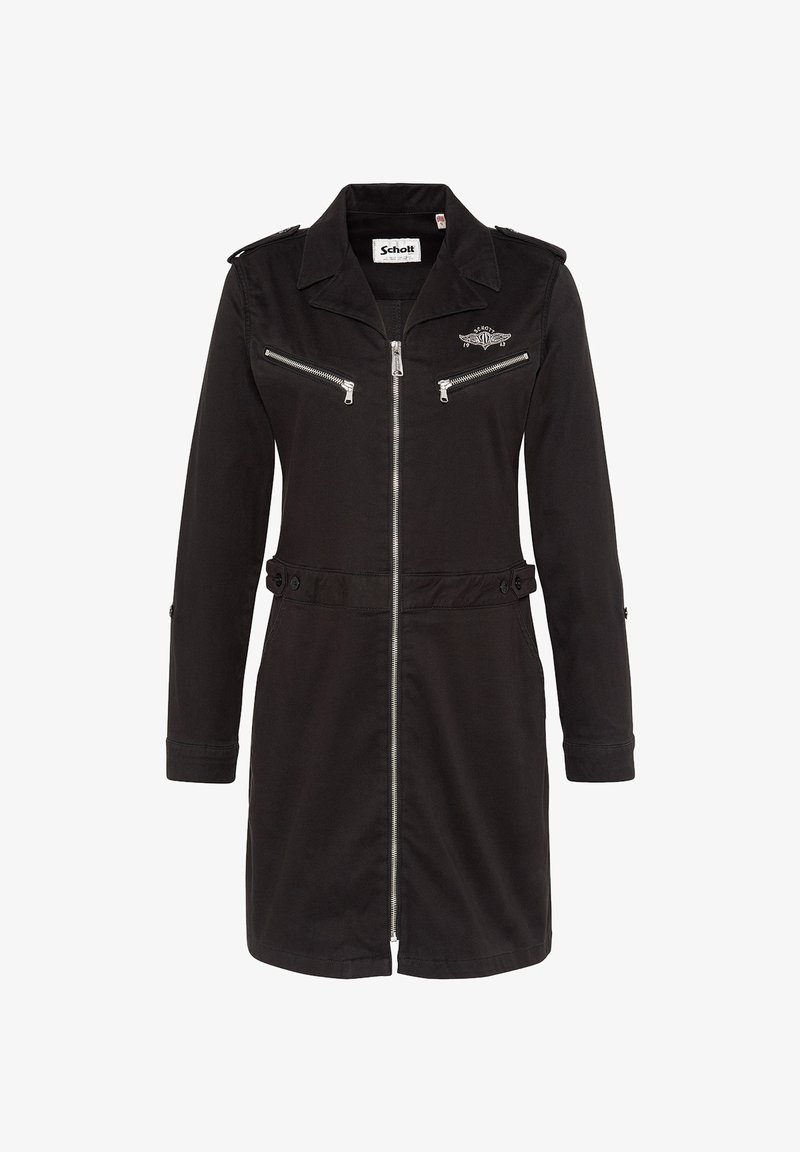 Manteau trench en coton noir avec une fermeture éclair à l'avant, deux poches poitrine zippées, des épaulettes et des détails de taille boutonnés. Manches longues et col.