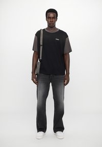 Evisu SKULL - Jeans a sigaretta - black