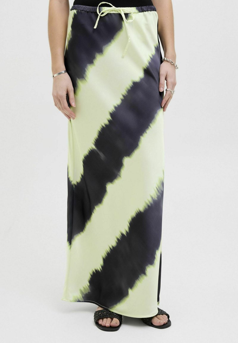Maxi rok gemaakt van lichte stof, met een tie-dye patroon in zwart en fel limoen groen, met een elastische tailleband en trekkoord.
