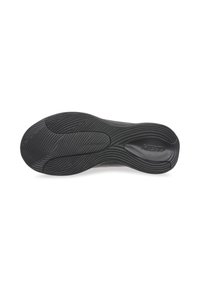 Suola di scarpa in gomma nera con una superficie texture caratterizzata da scanalature e creste curve. Il logo del marchio è impresso vicino all'area del tallone.