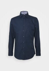 Marineblauwe langemouwen shirt van katoen, met een patroon in de binnenste kraag en knopen aan de voorkant. Soepele textuur, klassieke pasvorm.