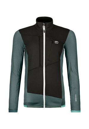 Black and teal jacket with a high collar, zippered pockets, textured sleeves, and a distinctive geometric design. Features white zippers.
