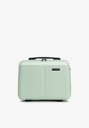 Malette rigide vert clair avec des rainures verticales texturées, poignée noire et logo "WITTCHEN" sur le devant, orientée vers l'avant.