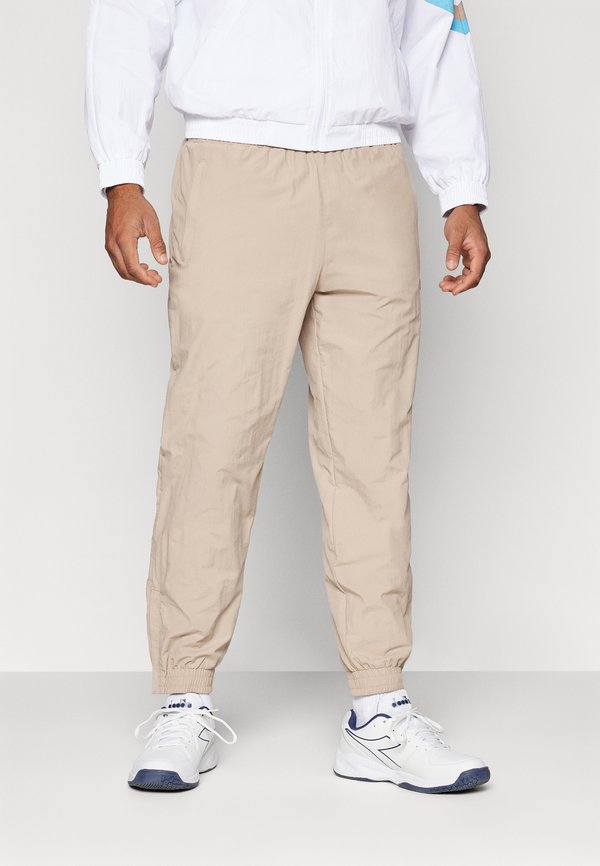 TRACK PANTS - Tracksuit bottoms - humus