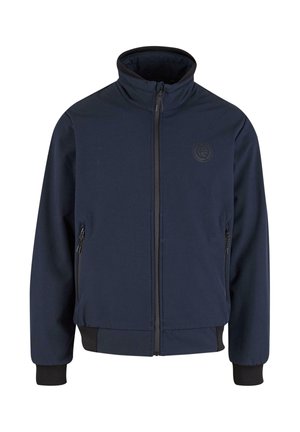 Giacca blu navy con colletto alto, zip frontale, due tasche laterali e dettagli neri sui polsini e sull'orlo. Presenta un logo sul petto.
