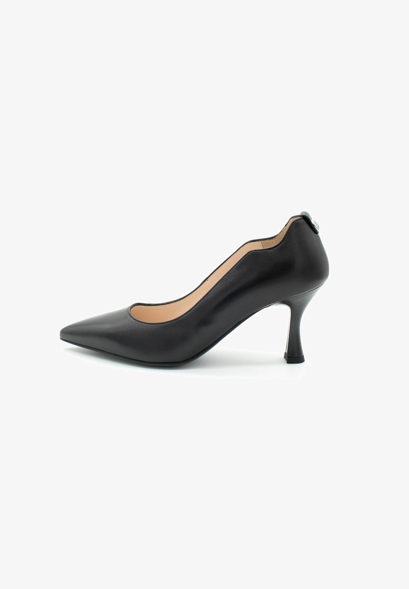 Black leather high-heeled pump with a pointed toe, curvy side cutouts, and a slim heel, featuring a small logo accent on the back.