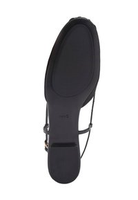 Black sandal sole with a smooth surface, rubber material, and textured grip pattern. Features adjustable ankle straps and gold accents.