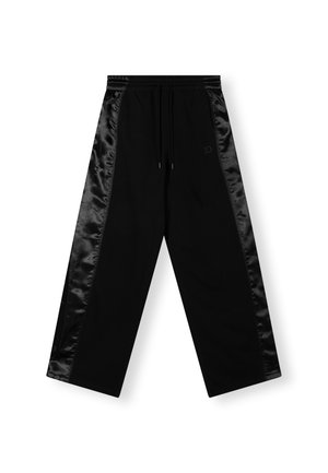 Pantalons noirs en coton avec des panneaux latéraux en satin. Comprend une taille élastique, un cordon de serrage et une coupe large.