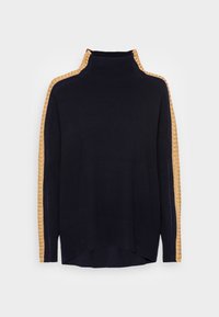 Pull bleu marine à col montant, avec des rayures latérales dorées texturées et un ourlet côtelé. Tissu doux, coupe décontractée, et fente avant.