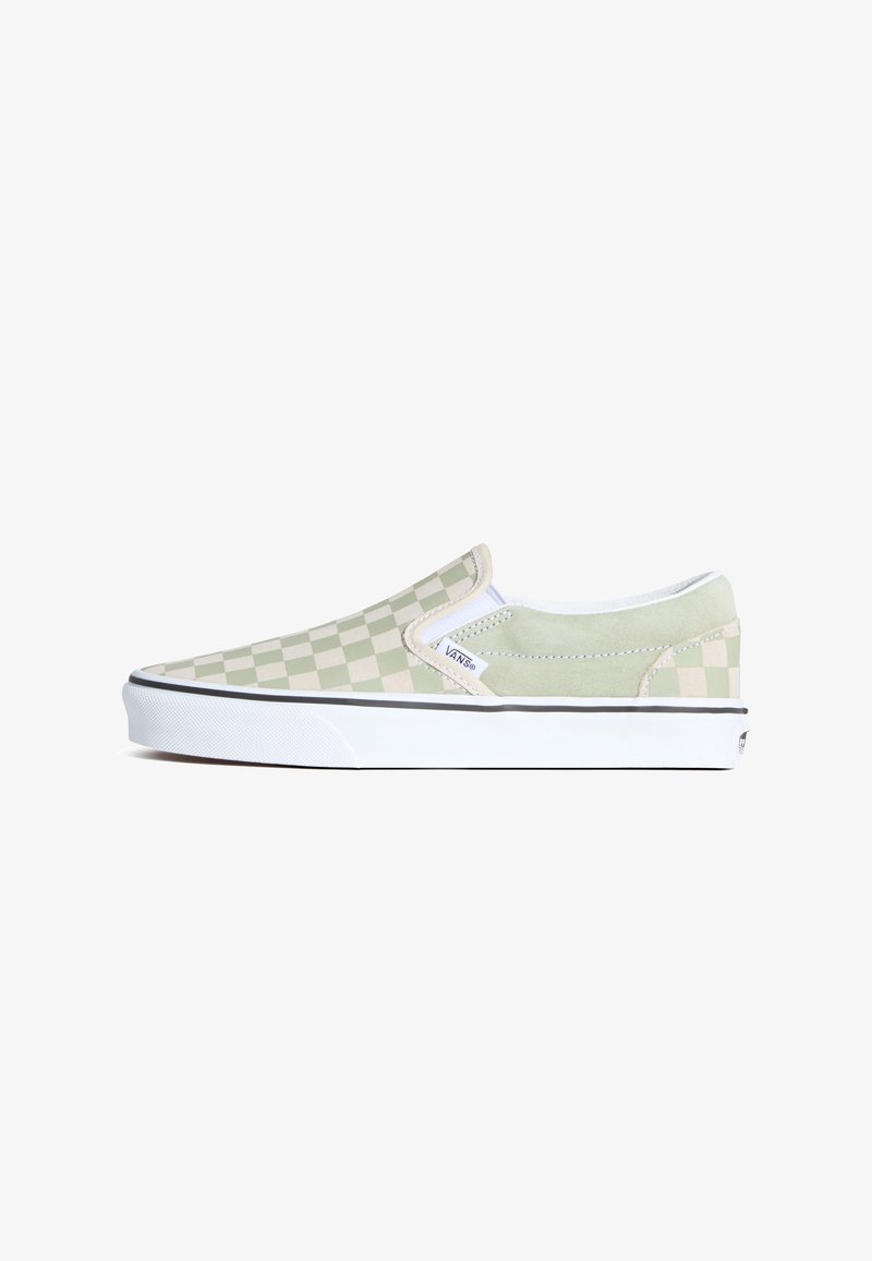 Slip-on skate shoes in light green with a checkered pattern and white accents; textured canvas upper and rubber sole for grip.