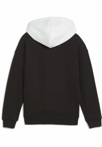 Sudadera negra de gran tamaño con capucha blanca en contraste, hecha de tela suave, con un ajuste relajado y puños y dobladillo acanalados.