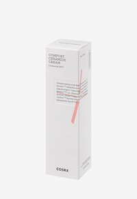 Boîte en carton blanc pour la crème COSRX Comfort Ceramide. Comprend du texte noir, une ligne d'accent rouge et la liste des ingrédients sur un côté. Taille : 80 g.