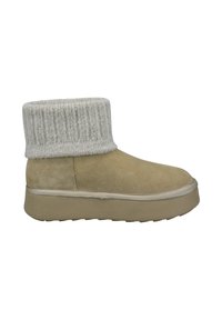 Beige Wildleder-Stiefelette mit einem dicken grauen Strickbund, flachem Gummisohle und einer Naht entlang der Oberkante und Sohlenkante.