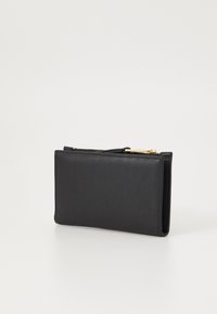 Black leather wallet with a smooth texture, rectangular shape, zip closure, and gold hardware accent. Minimalist design.