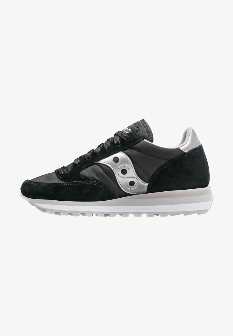 Black and gray sneakers with suede and fabric materials. Features a silver accent, round logo, and white rubber sole with a textured surface.
