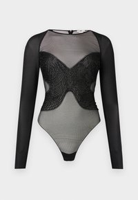 Μαύρο διαφανές ολόσωμο κορμάκι με μακρύ μανίκι, από δίχτυ ύφασμα και περίπλοκη υφή στο τούμπανο και το στήθος.