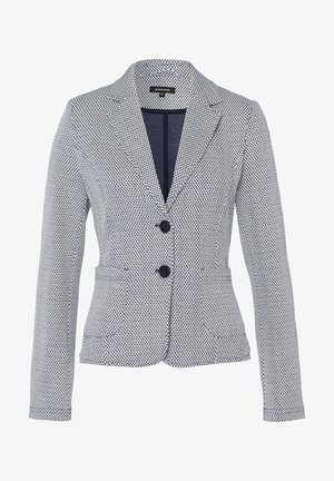 Blazer s přiléhavým střihem, vyrobený z texturované látky v námořnické modré barvě s bílými puntíky, s dvěma předními kapsami a dvěma knoflíky.