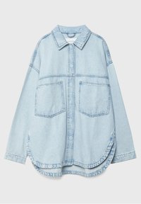 Light blue denim shirt with a classic collar, button closure, two front pockets, and rounded hem. Soft texture with visible stitching details.