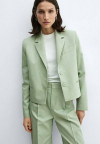 Mango Pantaloni - light green