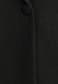 TORONTO  - Short coat - black