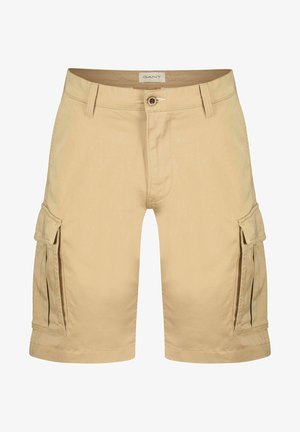 Beige cargo shorts lavet af bomuld med lynlås og knaplukning, der har sidelommer og en afslappet pasform. Detaljer inkluderer syede kanter.