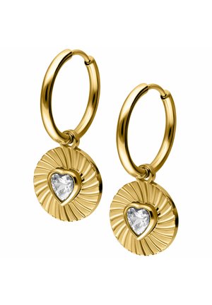 Gold hoop earrings with round, ridged pendants featuring heart-shaped clear gemstones in the center.
